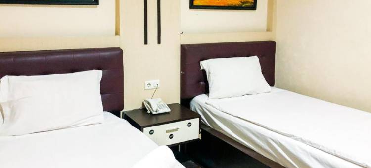 红多兹酒店@北干巴鲁惹兰阿里芬艾哈迈德(RedDoorz @ Jalan Arifin Ahmad Pekanbaru)图片