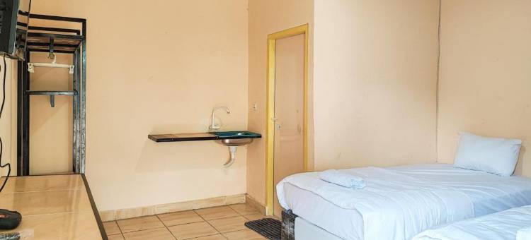 红门伊斯兰教义酒店靠近阿拉姆巴拉乔终点站占碑(RedDoorz Syariah Near Terminal Alam Barajo Jambi)图片