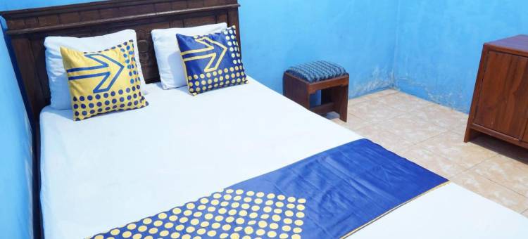 OYO 96881831 斯里甘地红岛海滩民宿，靠近潘切尔海滩(Hotel O Homestay Srikandi Pulau Merah BeachNearPantai Pancer)图片