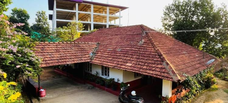 位于马迪凯里的1卧室-平方米|带5个独立浴室(Coorg Daffodil Guesthouse)图片