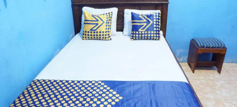 OYO 96881831 斯里甘地红岛海滩民宿，靠近潘切尔海滩(Hotel O Homestay Srikandi Pulau Merah BeachNearPantai Pancer)图片