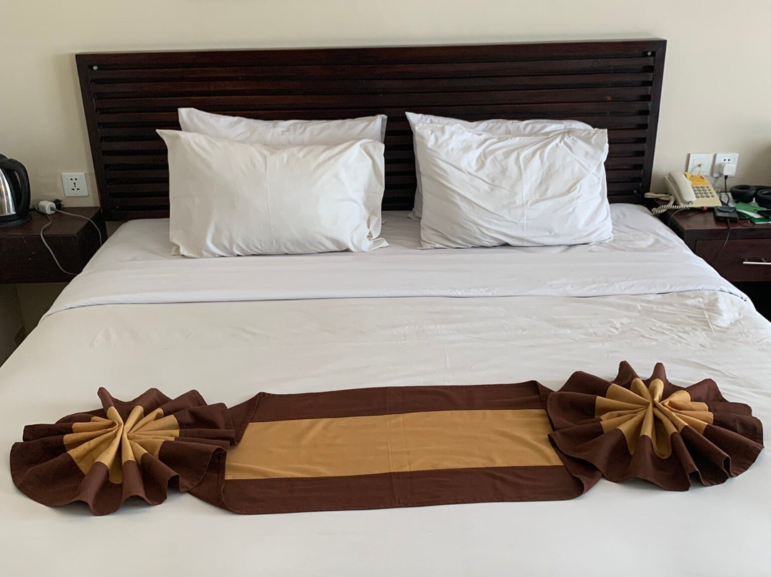 登巴萨酒店主图