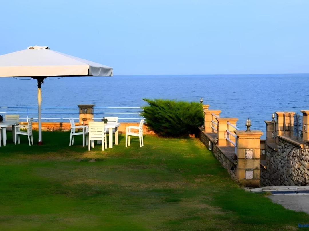 Alexandros Apartments , Beachfront Retreat Near Petalidi with Private Sunbeds & Sea View
