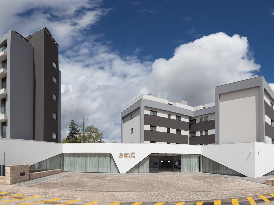 Essence Inn Marianos Hotel