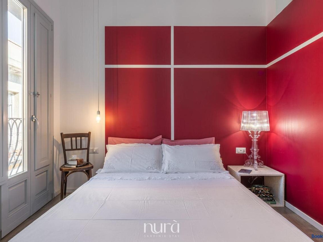 Q-riosity Boutique Rooms