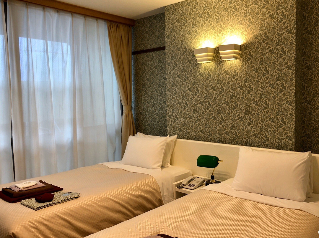 菊野屋酒店主图