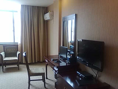 忻城县酒店住宿-庆源商务宾馆