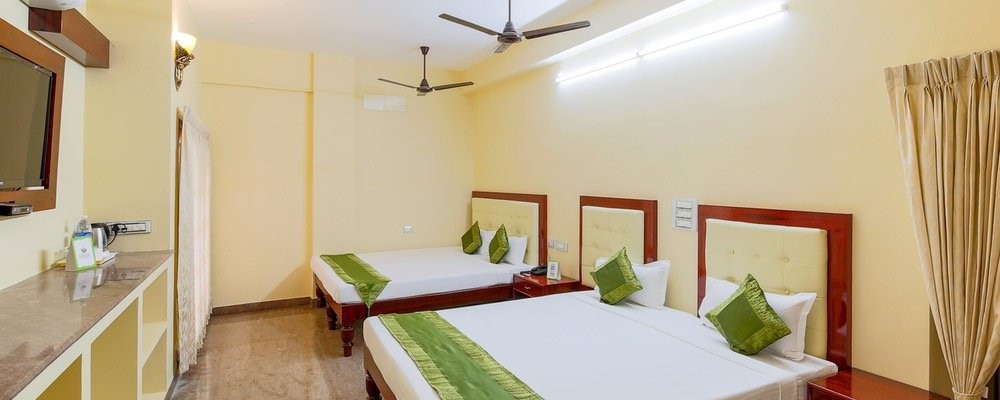 Treebo Grace Inn, 3 Min Walk From Promenade Beach