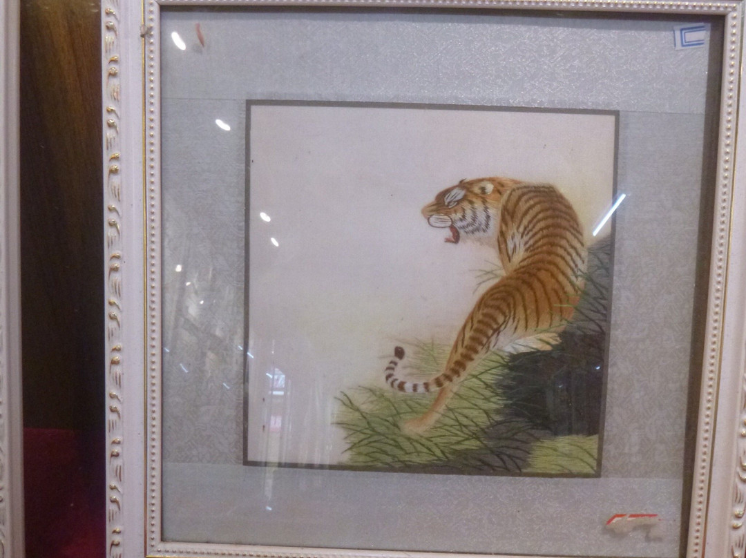 丽江纳西传统手工刺绣世家-丽江市必去景点