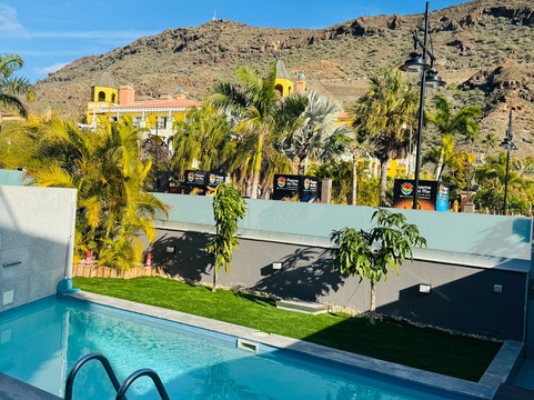 亲切莫甘天堂酒店主图