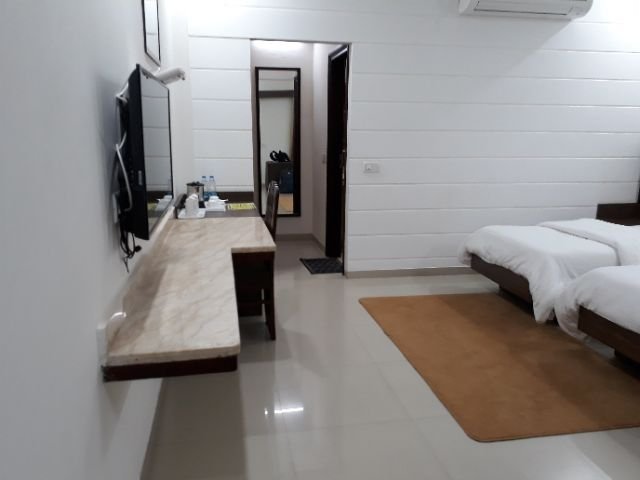 Hotel Whistling Greens-官方