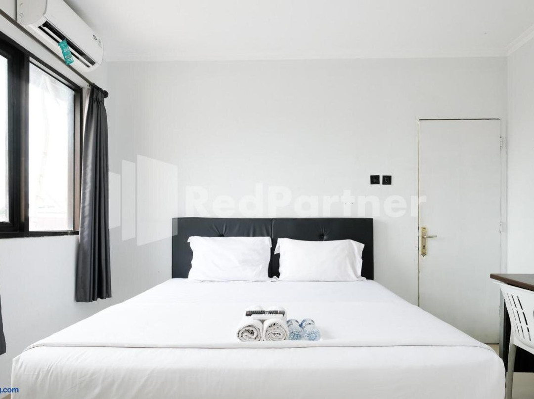 Aster Triplets Guest House JCM Mitra RedDoorz