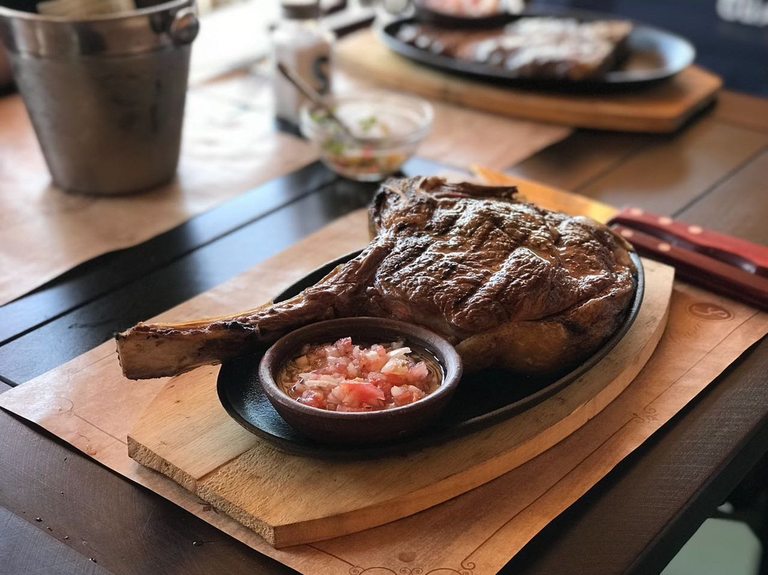 Chee Juan Carnes y Pizzas