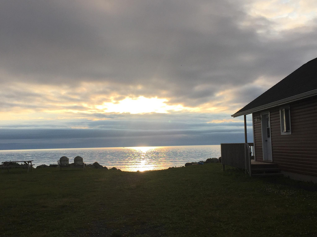 Motel & Chalets l'Acadien sur mer主图