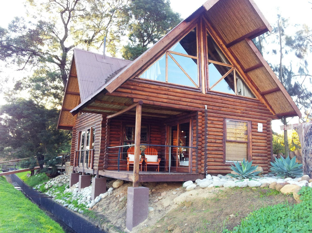 Arum Lily Cottage and Log Cabins