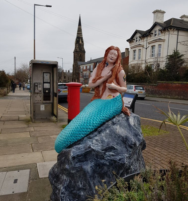 The Ebb & Flow Mermaid Statue