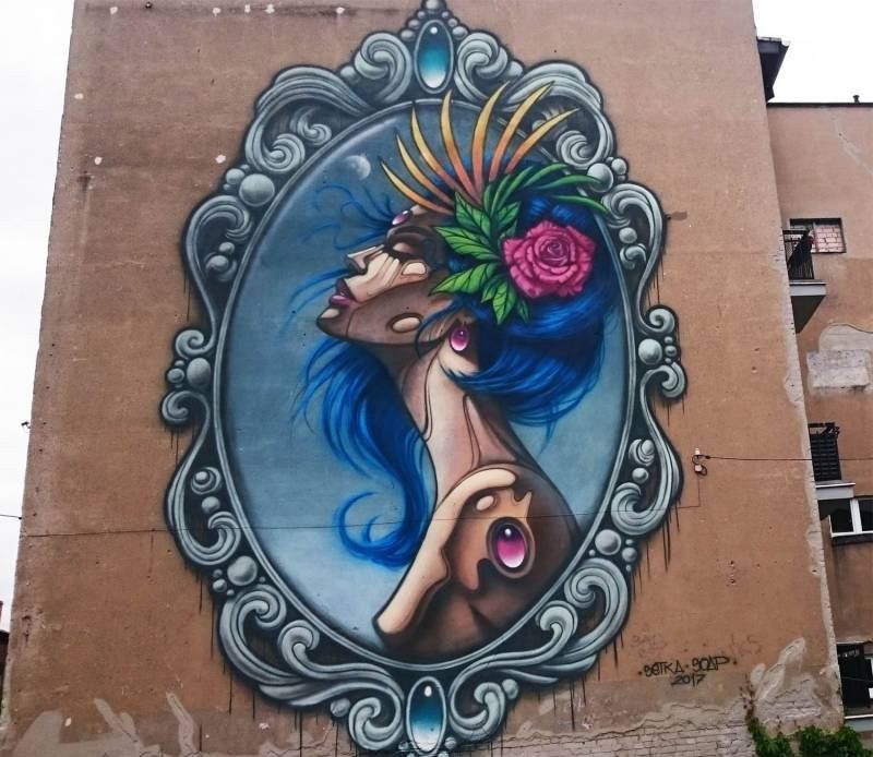 Nowa Wies Wielka旅游景点-"Panienka z okienka" Mural