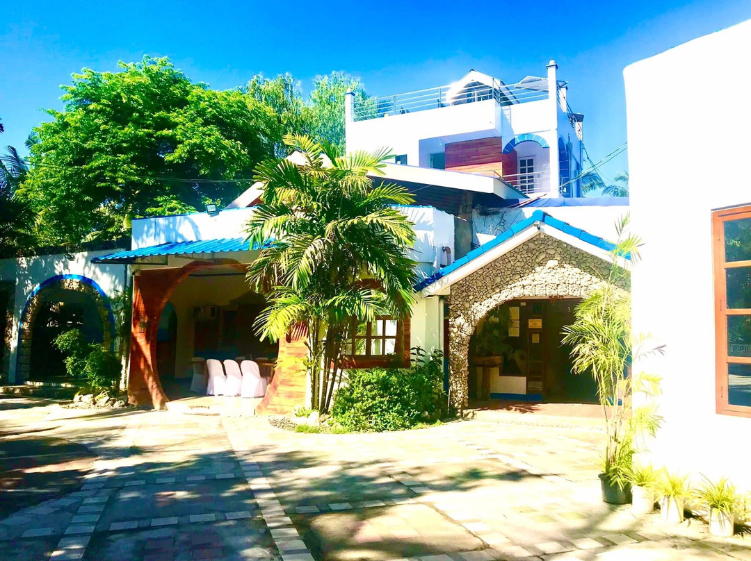 Maru's Beachfront Rooms主图