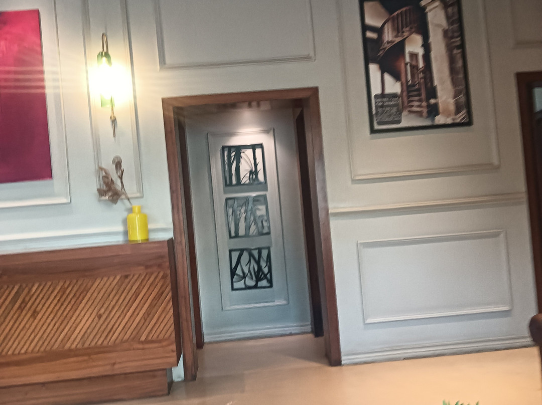 浦那维曼纳加尔7苹果酒店主图