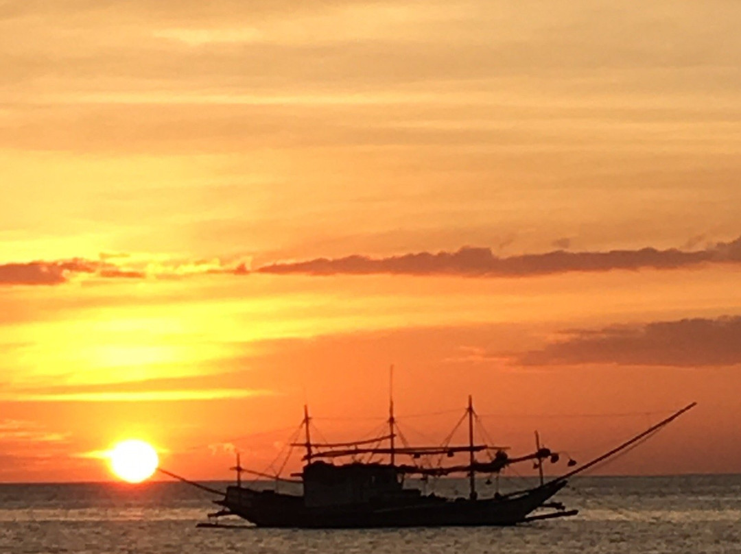 Maru's Beachfront Rooms主图