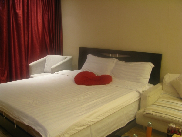 大连伊典伊景华园酒店式公寓-客卧