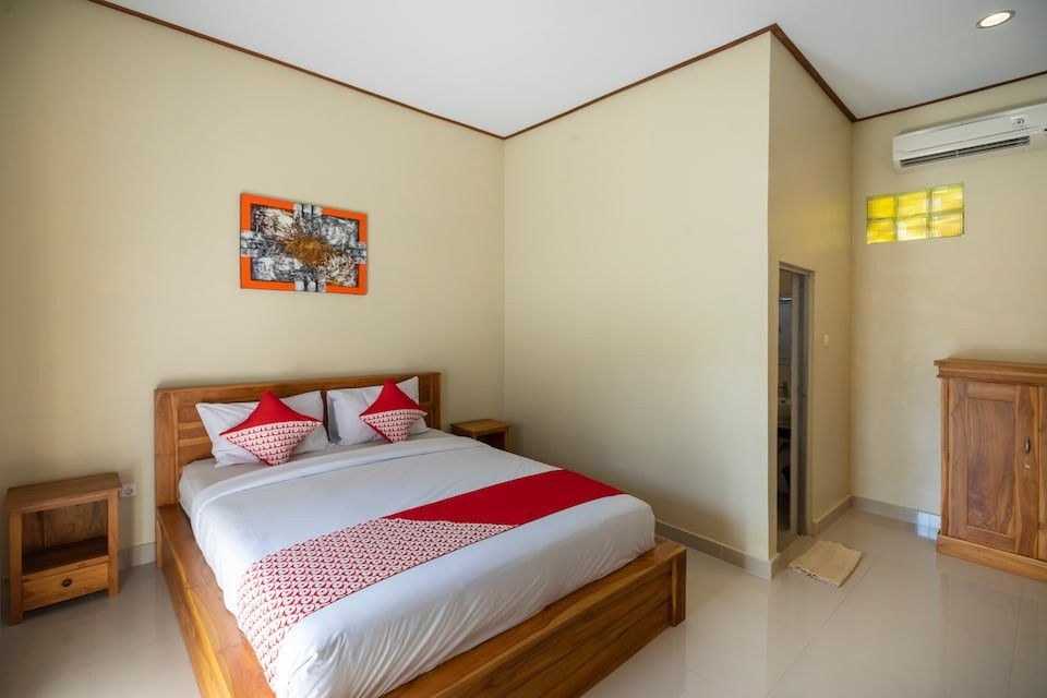 OYO 828 Lilis Cempaka Mas Guesthouse主图
