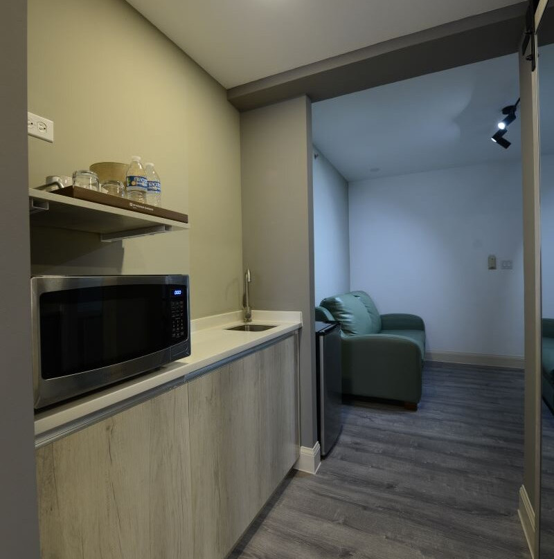 塔穆宁华美达酒店及套房主图