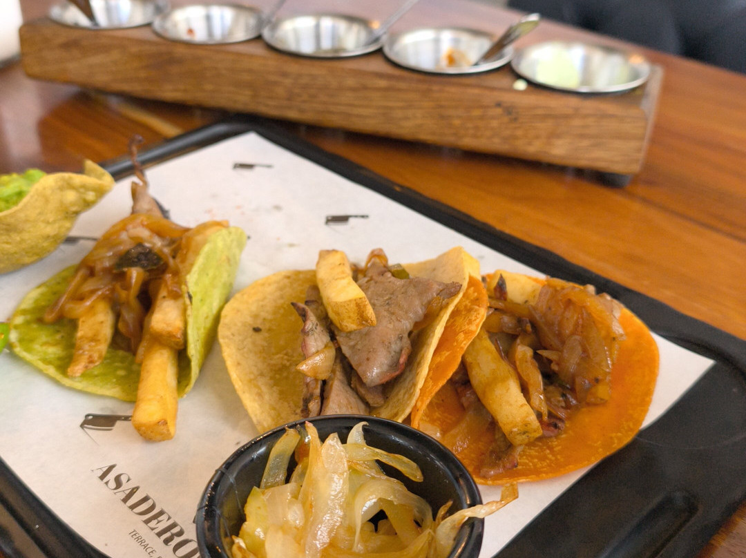 Asaderos Grill Cosmopol