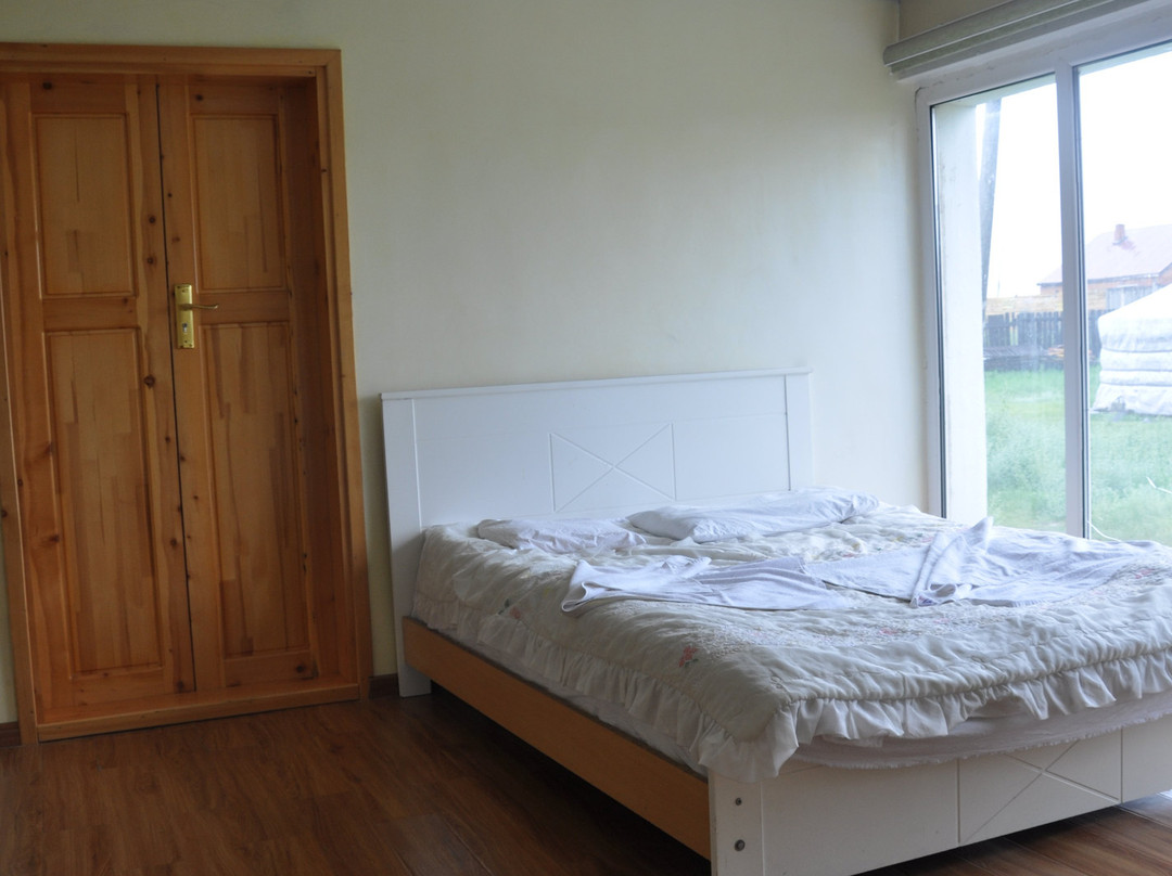 Family Guesthouse & Tours主图