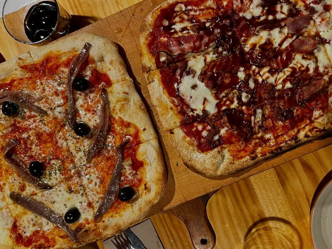 Kilómetros de Pizza