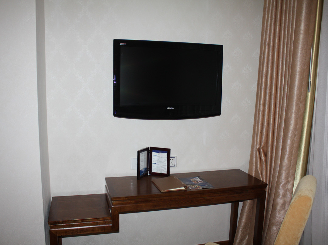 大连昱圣苑国际酒店（罗斯福广场西安路地铁站店）主图