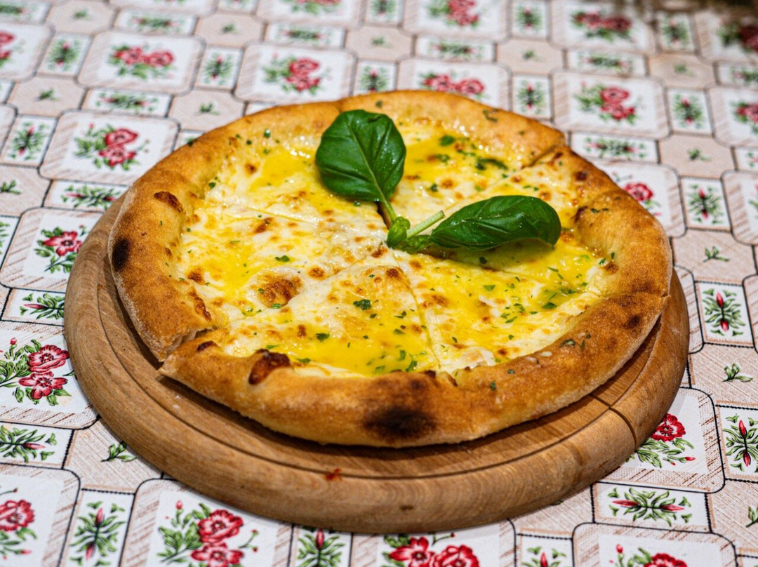 Tomi Pizza