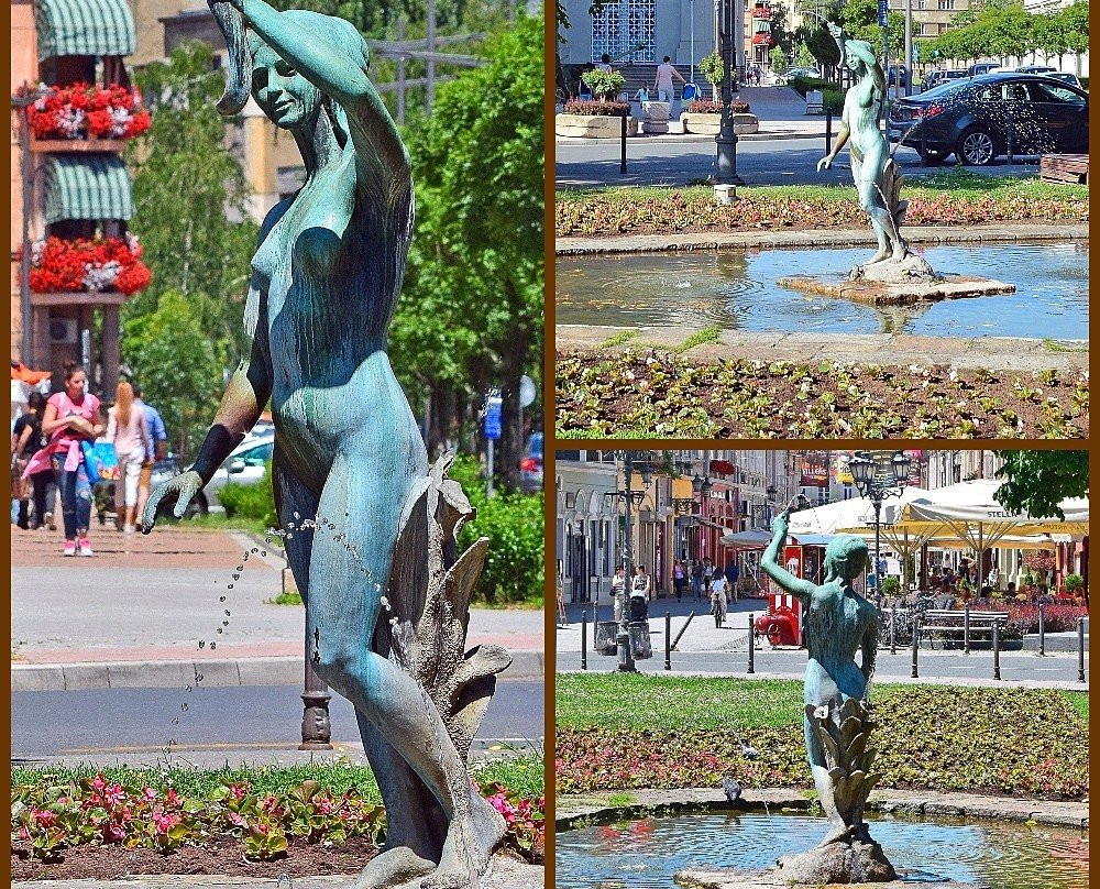 A Girl with the Horn of Plenty Statue景点图片