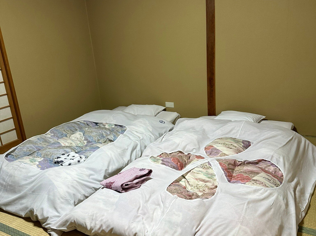 汤田中酒店主图