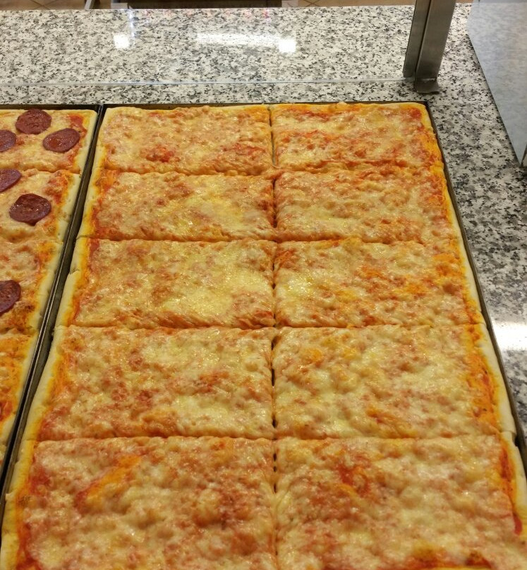 Pizzeria Paolo Taglio Pizza