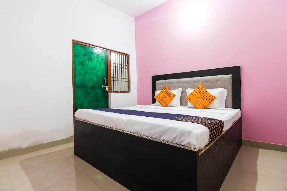 SPOT ON 62707 Day Night Hotel