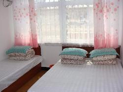 兴城市酒店住宿-阳光家庭宾馆