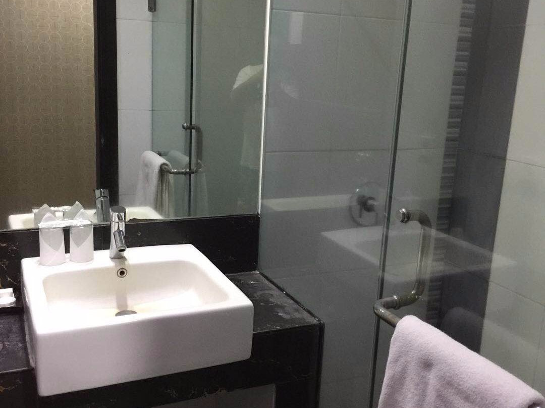 美娜多旅店主图