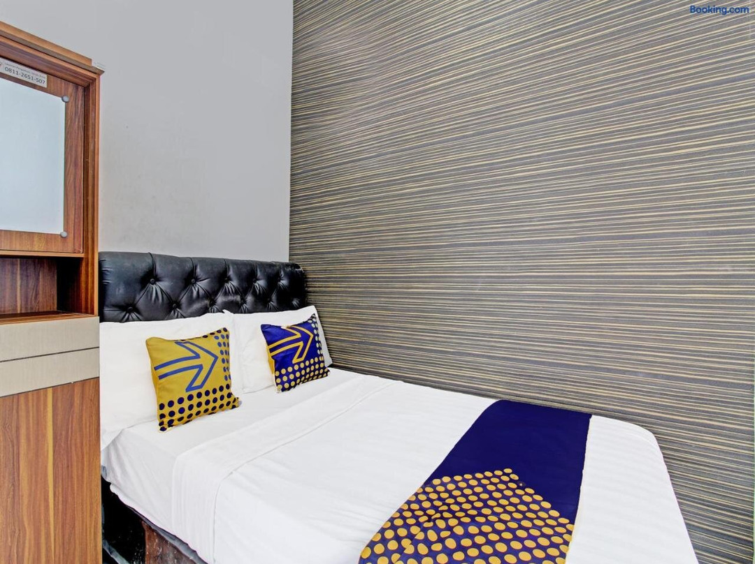 SPOT ON 91523 Kenari Guesthouse