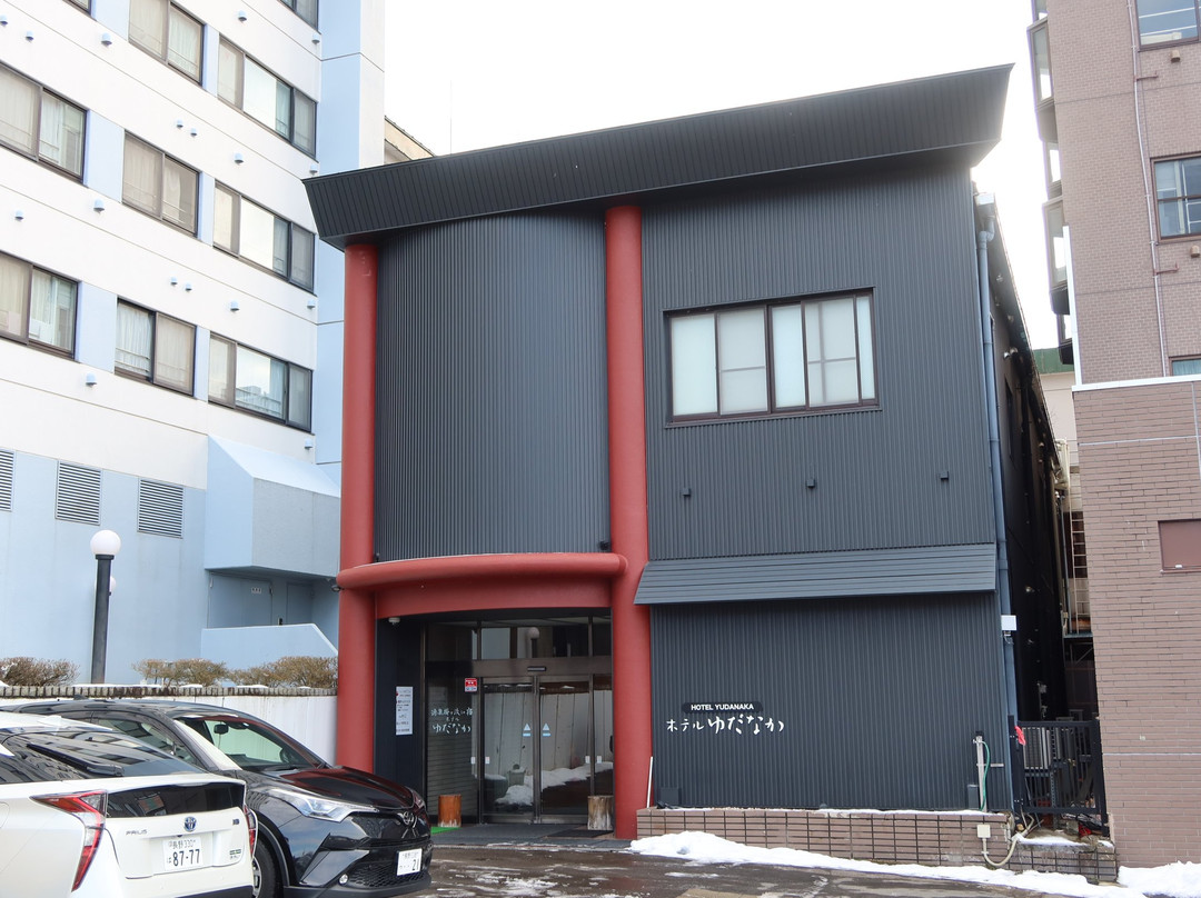 汤田中酒店主图