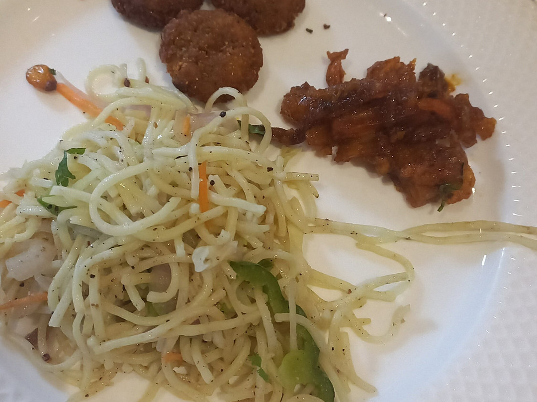 皇家兰花中央施莫加酒店主图