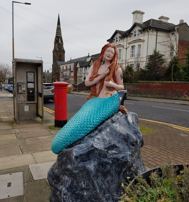 The Ebb & Flow Mermaid Statue