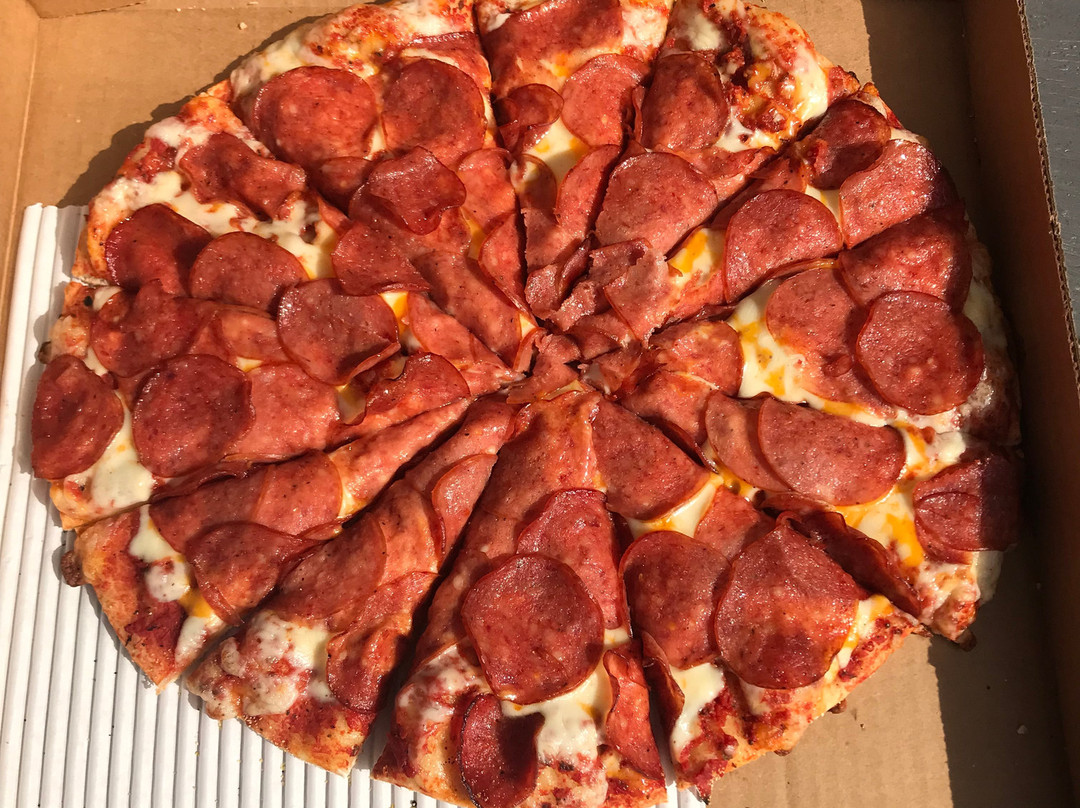 Toms House Of Pizza (Okotoks) Ltd