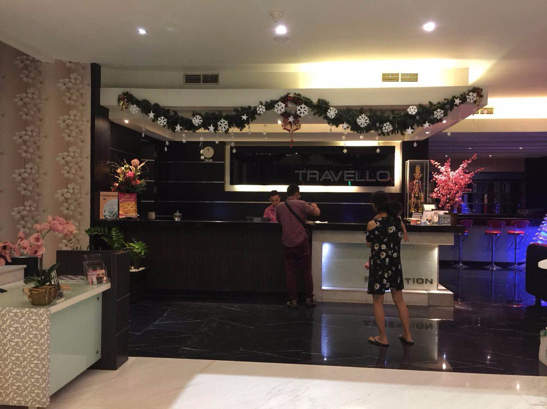 美娜多旅店主图