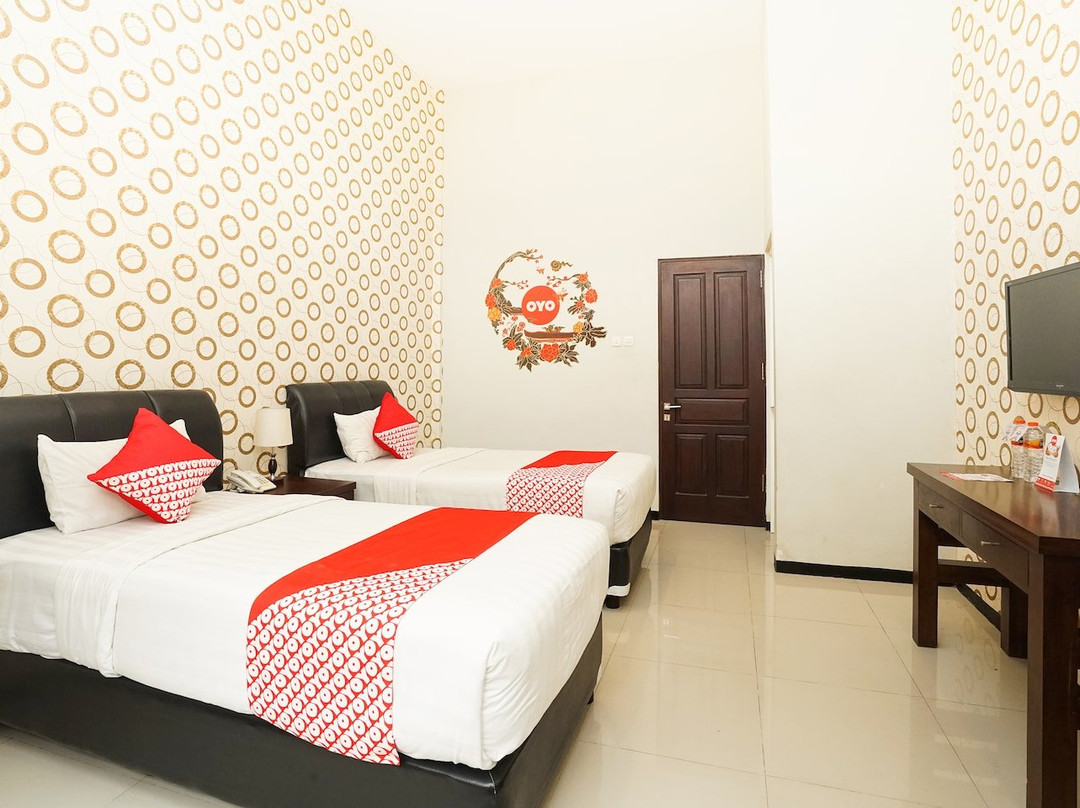 OYO 282 Putri Utari Guest House主图