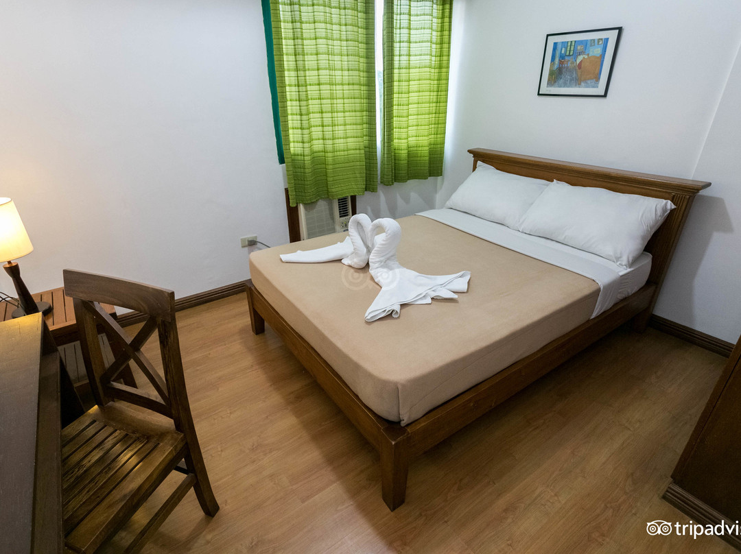 伊莎贝尔花园酒店及套房