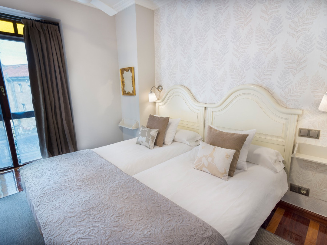 Hostal Cuatro Caminos Rooms主图