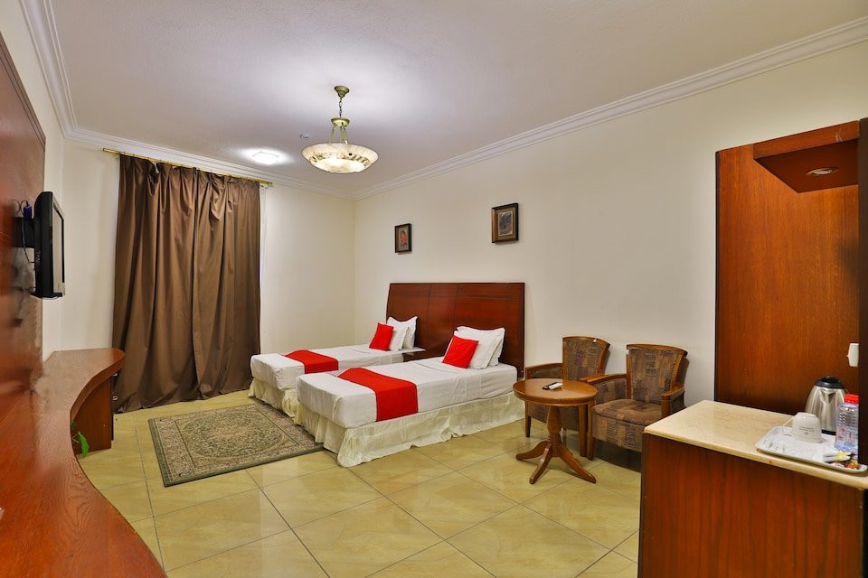 OYO 227 The New Address Hotel
