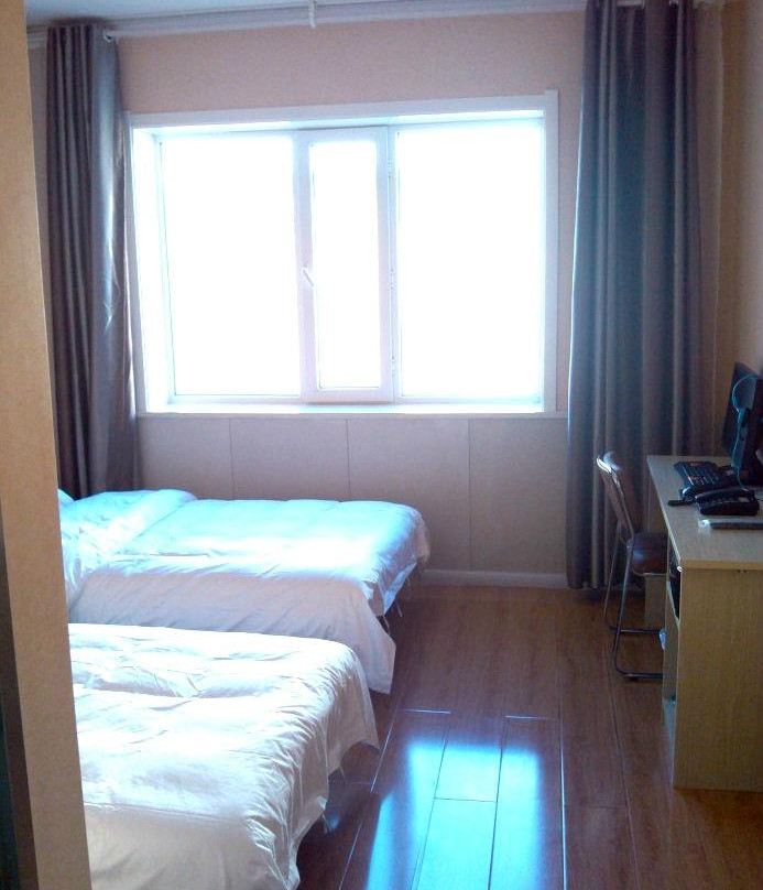 珲春梓豪宾馆一分店主图