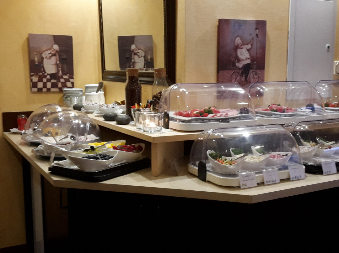 蓝火卡曼妮酒店主图